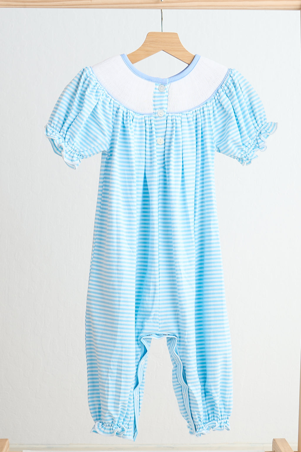 Blue puppy hand smocked girl romper