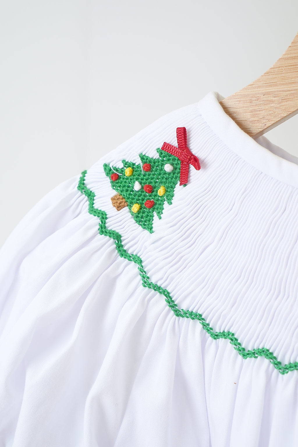 White chrismtas tree hand smocked girl romper